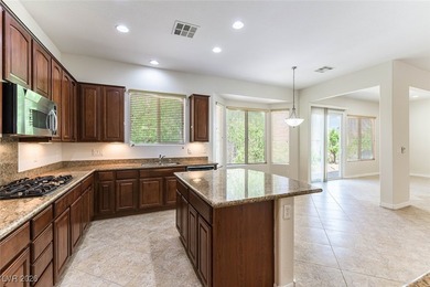 Step into refined living in this impeccably maintained Trenton on Revere Golf Club in Nevada - for sale on GolfHomes.com, golf home, golf lot