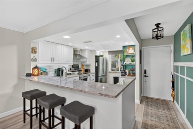 Discover the ease of villa living in this updated 2-bedroom, 2 on Highland Lakes Executive Golf Course in Florida - for sale on GolfHomes.com, golf home, golf lot