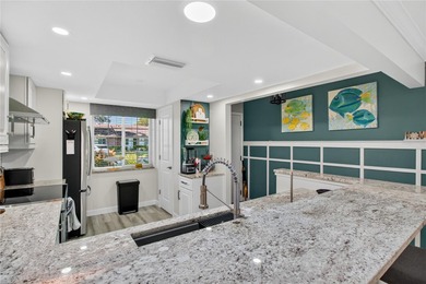 Discover the ease of villa living in this updated 2-bedroom, 2 on Highland Lakes Executive Golf Course in Florida - for sale on GolfHomes.com, golf home, golf lot