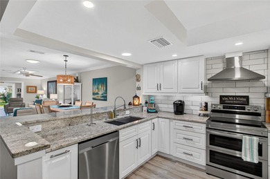 Discover the ease of villa living in this updated 2-bedroom, 2 on Highland Lakes Executive Golf Course in Florida - for sale on GolfHomes.com, golf home, golf lot