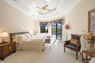 Regal in design and grand in proportion, this residence on Kensington Golf and Country Club in Florida - for sale on GolfHomes.com, golf home, golf lot