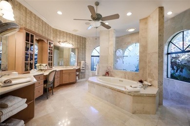 Regal in design and grand in proportion, this residence on Kensington Golf and Country Club in Florida - for sale on GolfHomes.com, golf home, golf lot
