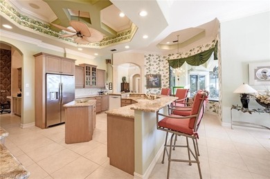Regal in design and grand in proportion, this residence on Kensington Golf and Country Club in Florida - for sale on GolfHomes.com, golf home, golf lot
