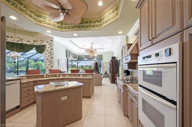 Regal in design and grand in proportion, this residence on Kensington Golf and Country Club in Florida - for sale on GolfHomes.com, golf home, golf lot