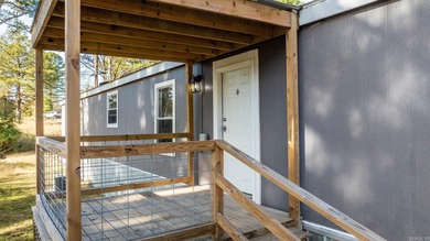 PERMANENT FOUNDATION, GREAT CONDITION, AND AFFORDABLE?! Watch on Mountain Ranch Golf Club in Arkansas - for sale on GolfHomes.com, golf home, golf lot