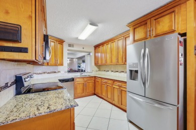 Make this spacious 2-bed, 2-bath condo, nestled within a on Boca Dunes Golf and Country Club in Florida - for sale on GolfHomes.com, golf home, golf lot