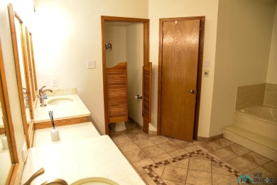 Perfectly positioned on the Hole 16 tee box, this beautifully on Chaparral Country Club in New Mexico - for sale on GolfHomes.com, golf home, golf lot