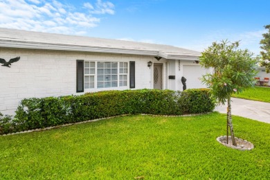 This Challenger model in desirable 55+ Palm Beach Leisureville on Leisureville Community Golf Course in Florida - for sale on GolfHomes.com, golf home, golf lot