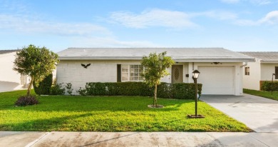 This Challenger model in desirable 55+ Palm Beach Leisureville on Leisureville Community Golf Course in Florida - for sale on GolfHomes.com, golf home, golf lot