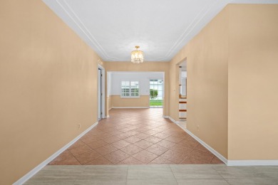 This Challenger model in desirable 55+ Palm Beach Leisureville on Leisureville Community Golf Course in Florida - for sale on GolfHomes.com, golf home, golf lot