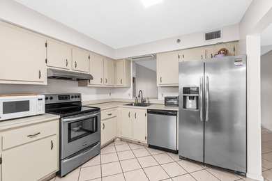 This impeccably maintained 2-bedroom, 2-bath condo with gorgeous on Marina Lakes Golf Course in Florida - for sale on GolfHomes.com, golf home, golf lot