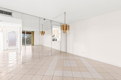 This impeccably maintained 2-bedroom, 2-bath condo with gorgeous on Marina Lakes Golf Course in Florida - for sale on GolfHomes.com, golf home, golf lot