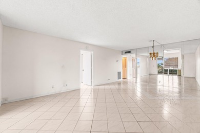 This impeccably maintained 2-bedroom, 2-bath condo with gorgeous on Marina Lakes Golf Course in Florida - for sale on GolfHomes.com, golf home, golf lot