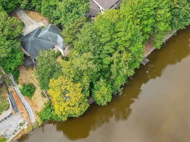 LAKEFRONT HOME for sale in CAROLINA TRACE - PRIVATE DOCK on LAKE on Carolina Trace Country Club in North Carolina - for sale on GolfHomes.com, golf home, golf lot