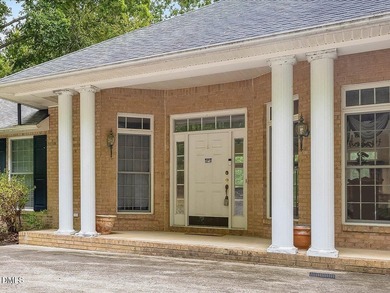 LAKEFRONT HOME for sale in CAROLINA TRACE - PRIVATE DOCK on LAKE on Carolina Trace Country Club in North Carolina - for sale on GolfHomes.com, golf home, golf lot