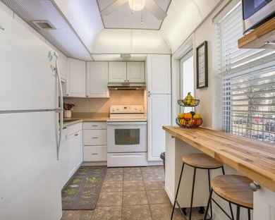 Pristine 2-bedroom, 2-bathroom condo in all-ages Palm Aire on  in Florida - for sale on GolfHomes.com, golf home, golf lot