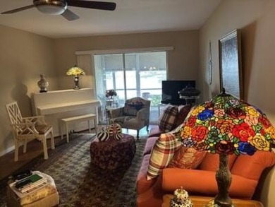 Wow, what a view! This 2-bedroom, 2-bath deluxe ground-floor on Wynmoor Golf Course in Florida - for sale on GolfHomes.com, golf home, golf lot