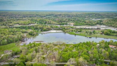 Tranquility at its finest along with amazing income opportunity on Oneida Municipal Golf Course in Tennessee - for sale on GolfHomes.com, golf home, golf lot