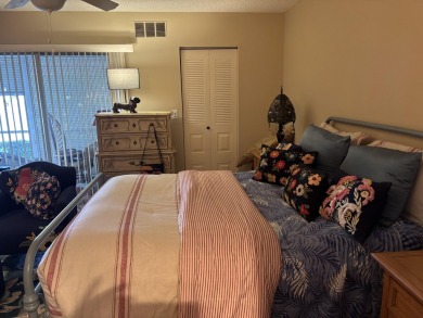 Wow, what a view! This 2-bedroom, 2-bath deluxe ground-floor on Wynmoor Golf Course in Florida - for sale on GolfHomes.com, golf home, golf lot
