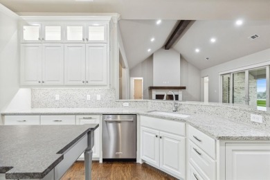 Built by Matteson Homes, this new construction home offers on Pecan Plantation Country Club in Texas - for sale on GolfHomes.com, golf home, golf lot