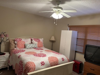 Wow, what a view! This 2-bedroom, 2-bath deluxe ground-floor on Wynmoor Golf Course in Florida - for sale on GolfHomes.com, golf home, golf lot