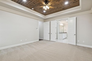 Built by Matteson Homes, this new construction home offers on Pecan Plantation Country Club in Texas - for sale on GolfHomes.com, golf home, golf lot