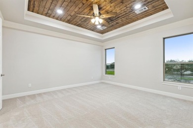 Built by Matteson Homes, this new construction home offers on Pecan Plantation Country Club in Texas - for sale on GolfHomes.com, golf home, golf lot