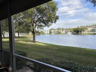 Wow, what a view! This 2-bedroom, 2-bath deluxe ground-floor on Wynmoor Golf Course in Florida - for sale on GolfHomes.com, golf home, golf lot
