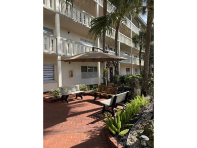 Wow, what a view! This 2-bedroom, 2-bath deluxe ground-floor on Wynmoor Golf Course in Florida - for sale on GolfHomes.com, golf home, golf lot