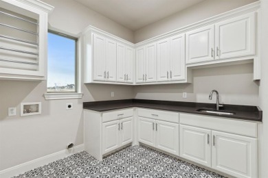 Built by Matteson Homes, this new construction home offers on Pecan Plantation Country Club in Texas - for sale on GolfHomes.com, golf home, golf lot