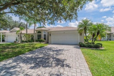 This gorgeous home has it all!  Check out the curb appeal of the on Falcon Watch Golf Club in Florida - for sale on GolfHomes.com, golf home, golf lot