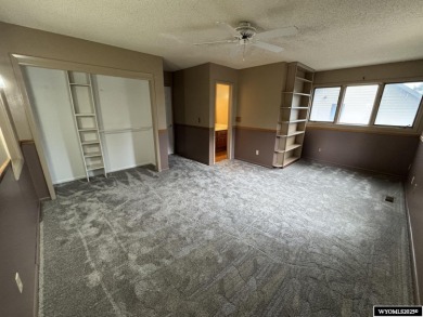 Welcome home to this thoughtfully updated tri-level townhouse on Riverton Country Club in Wyoming - for sale on GolfHomes.com, golf home, golf lot