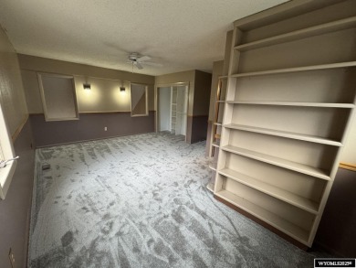 Welcome home to this thoughtfully updated tri-level townhouse on Riverton Country Club in Wyoming - for sale on GolfHomes.com, golf home, golf lot