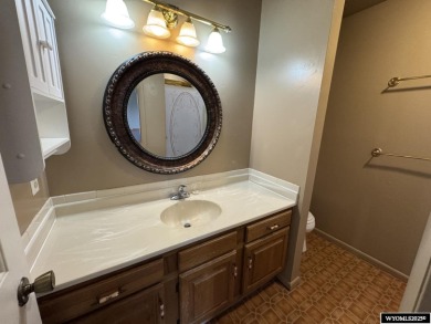 Welcome home to this thoughtfully updated tri-level townhouse on Riverton Country Club in Wyoming - for sale on GolfHomes.com, golf home, golf lot