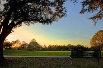 Exclusive First-Floor Condo in Hunter's Green Golf & Gate on Hunters Green Country Club in Florida - for sale on GolfHomes.com, golf home, golf lot