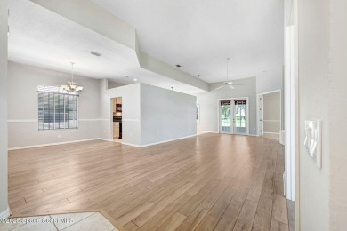 Nestled along the 9th fairway of a picturesque golf course, this on Baytree National Golf Links in Florida - for sale on GolfHomes.com, golf home, golf lot