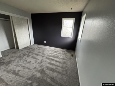 Welcome home to this thoughtfully updated tri-level townhouse on Riverton Country Club in Wyoming - for sale on GolfHomes.com, golf home, golf lot