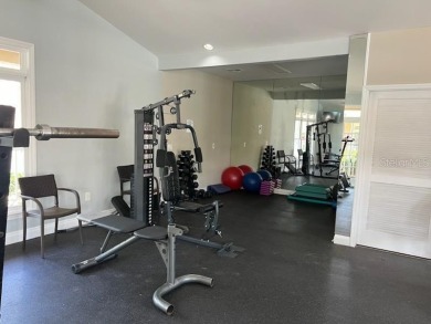 Exclusive First-Floor Condo in Hunter's Green Golf & Gate on Hunters Green Country Club in Florida - for sale on GolfHomes.com, golf home, golf lot