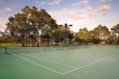 Exclusive First-Floor Condo in Hunter's Green Golf & Gate on Hunters Green Country Club in Florida - for sale on GolfHomes.com, golf home, golf lot