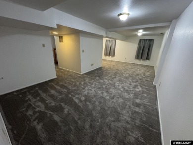 Welcome home to this thoughtfully updated tri-level townhouse on Riverton Country Club in Wyoming - for sale on GolfHomes.com, golf home, golf lot