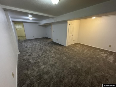 Welcome home to this thoughtfully updated tri-level townhouse on Riverton Country Club in Wyoming - for sale on GolfHomes.com, golf home, golf lot