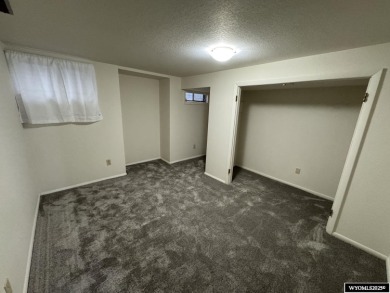 Welcome home to this thoughtfully updated tri-level townhouse on Riverton Country Club in Wyoming - for sale on GolfHomes.com, golf home, golf lot