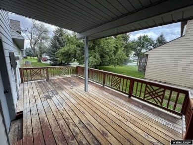 Welcome home to this thoughtfully updated tri-level townhouse on Riverton Country Club in Wyoming - for sale on GolfHomes.com, golf home, golf lot