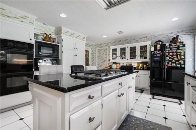 This gated estate offers a lavish, resort-style atmosphere where on Heron Lakes Country Club in Alabama - for sale on GolfHomes.com, golf home, golf lot