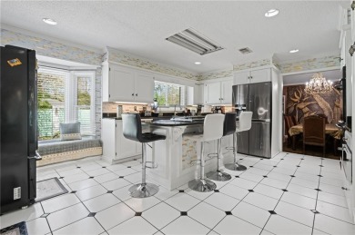 This gated estate offers a lavish, resort-style atmosphere where on Heron Lakes Country Club in Alabama - for sale on GolfHomes.com, golf home, golf lot
