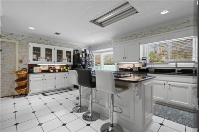This gated estate offers a lavish, resort-style atmosphere where on Heron Lakes Country Club in Alabama - for sale on GolfHomes.com, golf home, golf lot