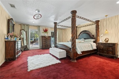 This gated estate offers a lavish, resort-style atmosphere where on Heron Lakes Country Club in Alabama - for sale on GolfHomes.com, golf home, golf lot