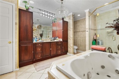 This gated estate offers a lavish, resort-style atmosphere where on Heron Lakes Country Club in Alabama - for sale on GolfHomes.com, golf home, golf lot
