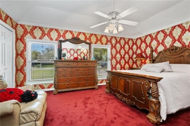 This gated estate offers a lavish, resort-style atmosphere where on Heron Lakes Country Club in Alabama - for sale on GolfHomes.com, golf home, golf lot