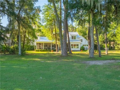 Tucked at the end of a quiet cul-de-sac in the gated coastal on The King and Prince Golf Course, Home of the Hampton Club in Georgia - for sale on GolfHomes.com, golf home, golf lot